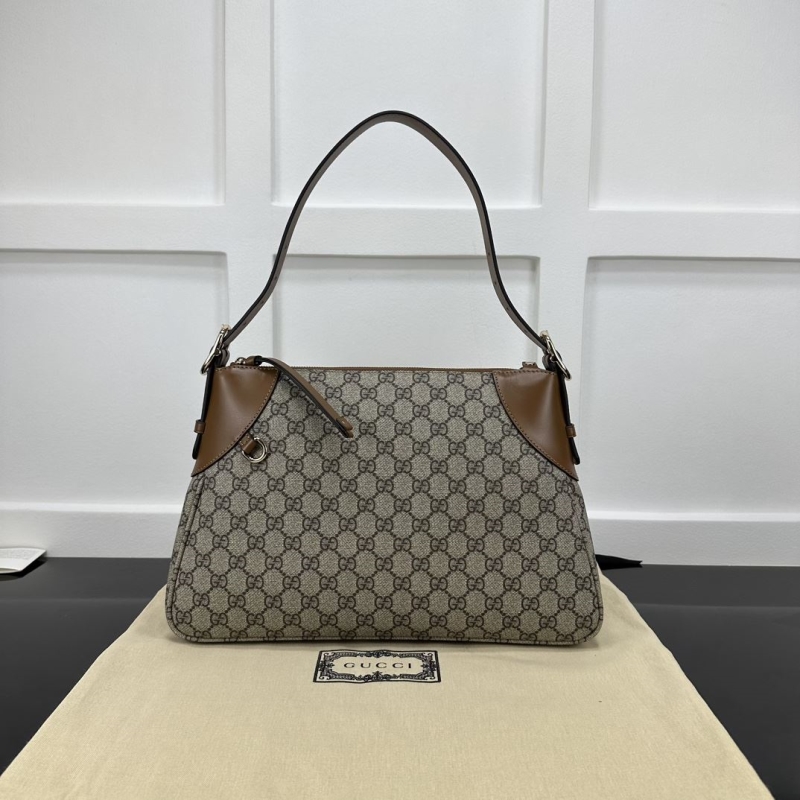 G*u*i top handle bags